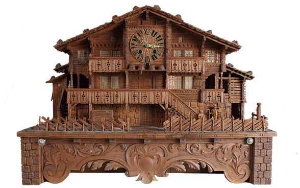 Chalet con orologio e automa musicale